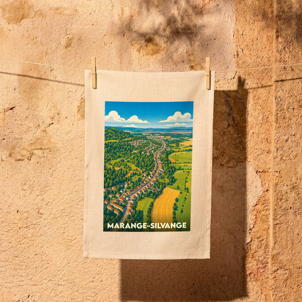 Torchon souvenir de la ville de Marange-Silvange avec une illustration paysagère stylisée.