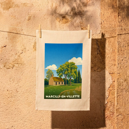 Torchon souvenir de la ville de Marcilly-en-Villette avec une illustration champêtre stylisée.