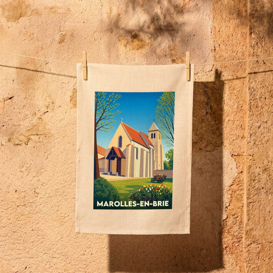 Torchon souvenir de la ville de Marolles-en-Brie avec une illustration stylisée de son église.