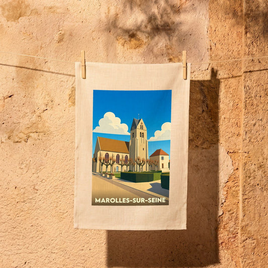Torchon souvenir de la ville de Marolles-sur-Seine avec une illustration stylisée de son église.
