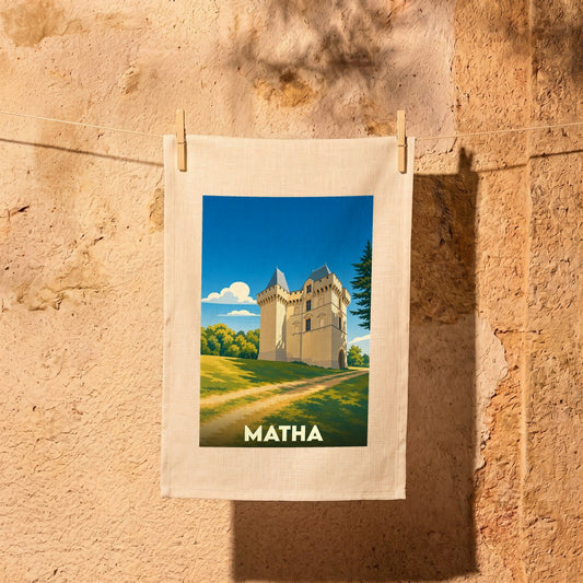 Torchon souvenir de la ville de Matha illustré d'un château de style rétro.