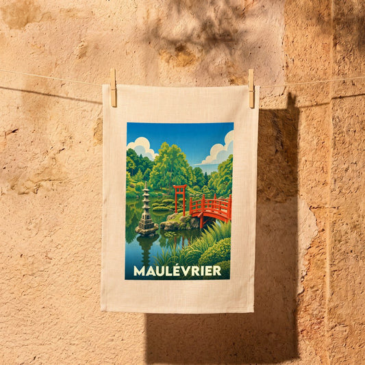 Torchon souvenir de la ville de Maulévrier avec une illustration stylisée d'un jardin japonais.