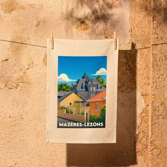 Torchon souvenir de la ville de Mazères-Lezons avec une illustration stylisée de ses bâtiments typiques.