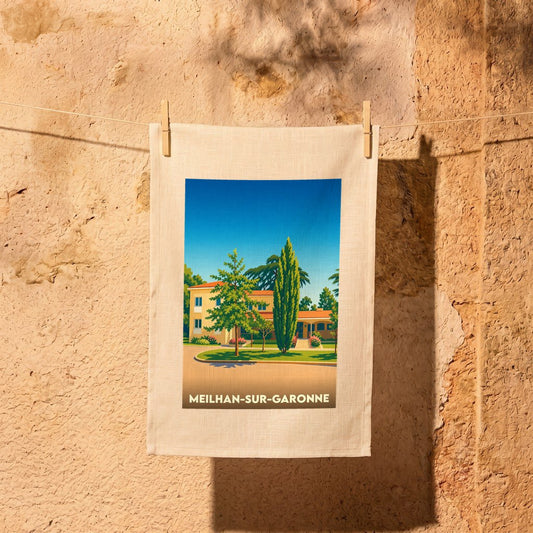 Torchon souvenir de la ville de Meilhan-sur-Garonne avec une illustration stylisée d'une villa ensoleillée.