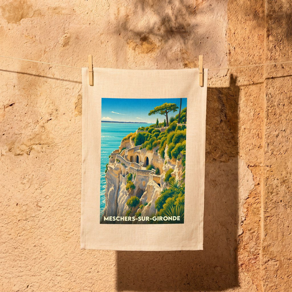 Torchon souvenir de la ville de Meschers-sur-Gironde avec une illustration stylisée de ses falaises et habitations troglodytiques.