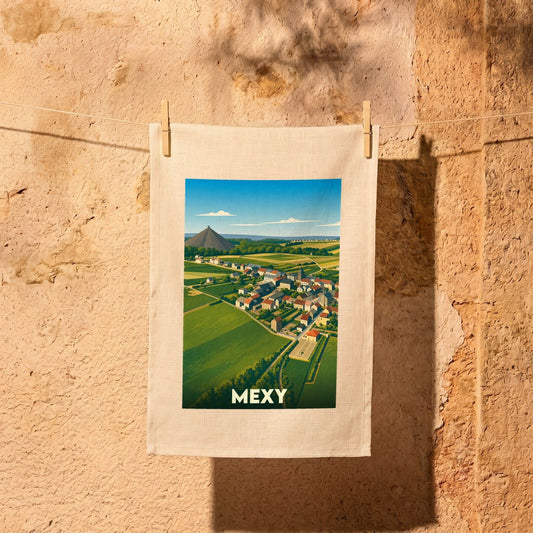 Torchon souvenir de la ville de Mexy avec une illustration stylisée d'un paysage de campagne.
