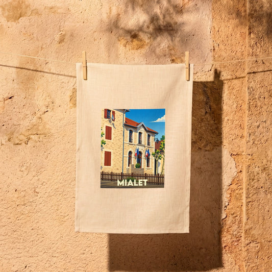 Torchon souvenir de la ville de Mialet avec une illustration stylisée.
