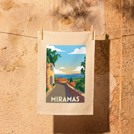 Torchon souvenir de la ville de Miramas avec une illustration stylisée.