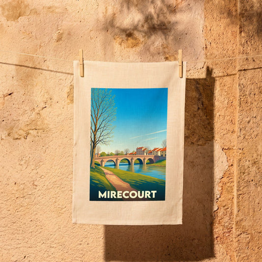 Torchon souvenir de la ville de Mirecourt avec une illustration stylisée représentant son pont de pierre.