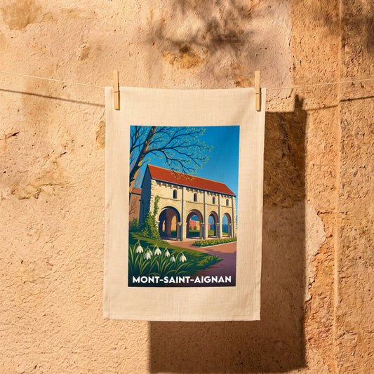 Torchon souvenir de la ville de Mont-Saint-Aignan avec une illustration stylisée de son patrimoine architectural.