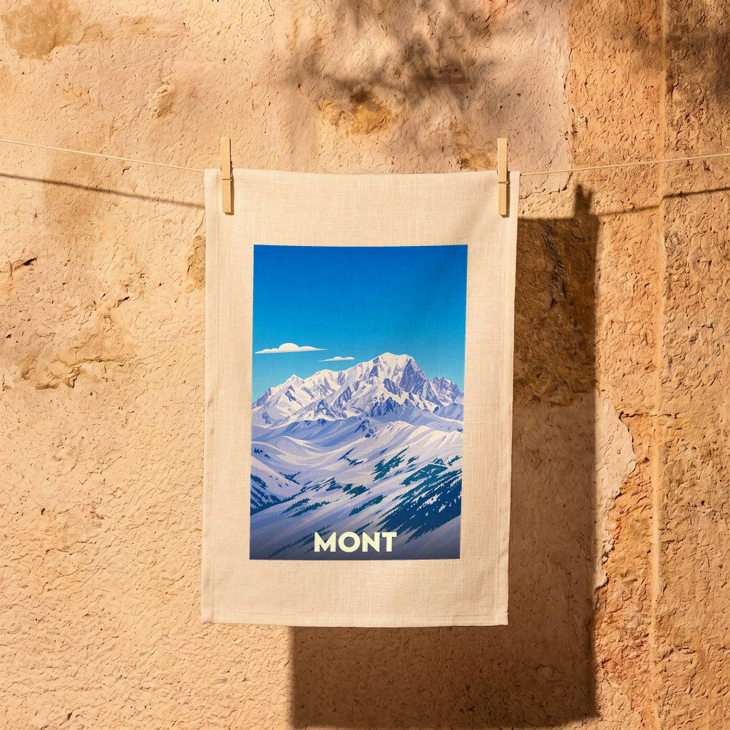 Torchon souvenir de la ville de Mont avec une illustration stylisée de montagnes enneigées.