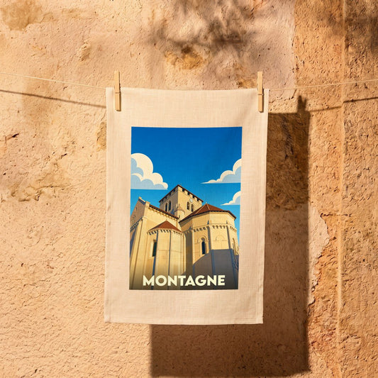 Torchon souvenir de la ville de Montagne avec une illustration stylisée d'une église sous un ciel bleu.