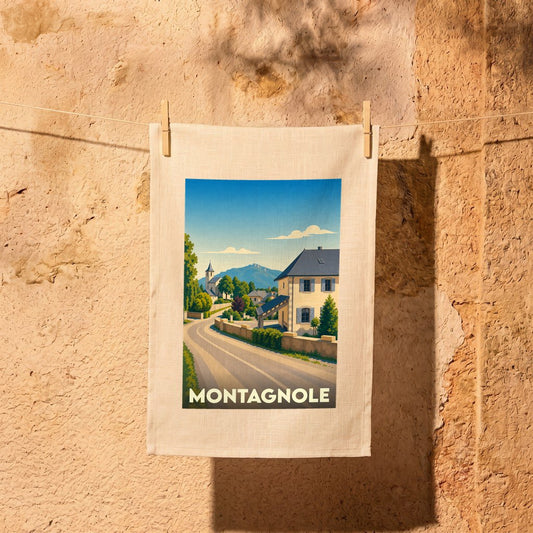 Torchon souvenir de la ville de Montagnole avec une illustration stylisée.