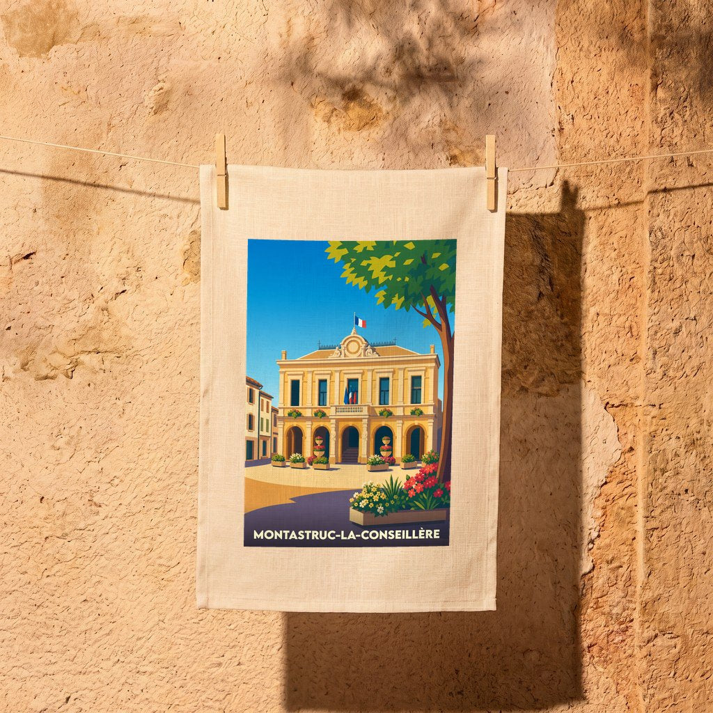 Torchon souvenir de Montastruc-la-Conseillère illustré par une vue stylisée de la mairie sous un ciel bleu.
