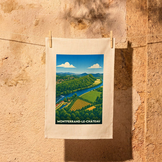 Torchon souvenir de Montferrand-le-Château orné d'une illustration paysagère stylisée.