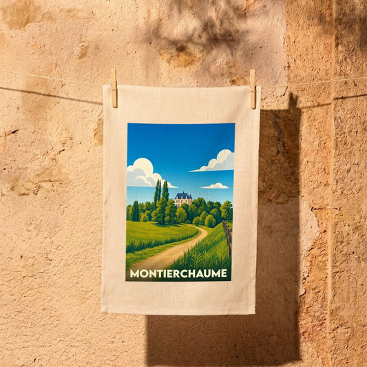 Torchon souvenir de la ville de Montierchaume avec une illustration stylisée d'un paysage de campagne.