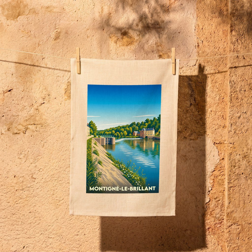 Torchon souvenir de la ville de Montigné-le-Brillant avec une illustration stylisée d'un paysage fluvial.