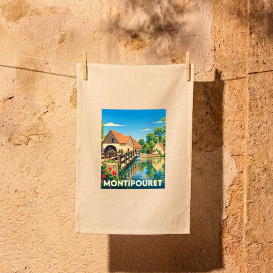 Torchon souvenir de la ville de Montipouret avec une illustration stylisée d'un moulin à eau.