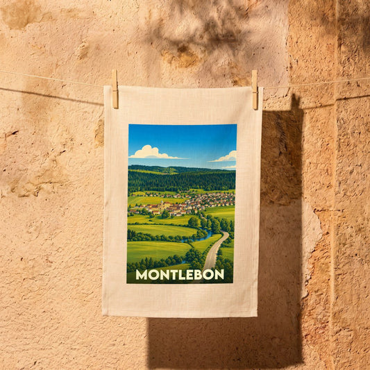 Torchon souvenir de la ville de Montlebon avec une illustration paysagère stylisée.
