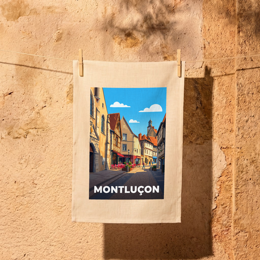 Torchon souvenir de la ville de Montluçon avec une illustration stylisée de ses rues.