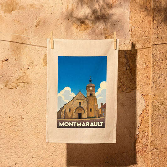 Torchon souvenir de la ville de Montmarault avec une illustration stylisée d'une église.