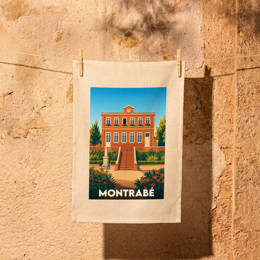 Torchon souvenir de la ville de Montrabé avec une illustration stylisée d'un bâtiment communal.