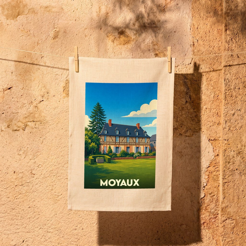 Torchon souvenir de la ville de Moyaux avec une illustration stylisée d'un manoir normand.