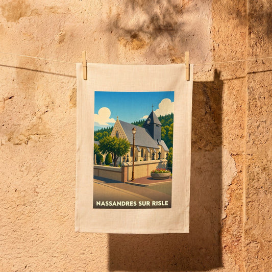 Torchon souvenir de la ville de Nassandres sur Risle avec une illustration stylisée d'une église et son cimetière.