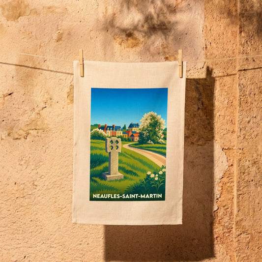 Torchon souvenir de la ville de Neaufles-Saint-Martin avec une illustration stylisée d'un paysage normand.