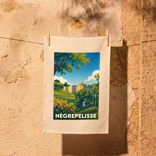 Torchon souvenir de la ville de Nègrepelisse avec une illustration stylisée de son château.