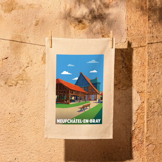 Torchon souvenir de la ville de Neufchâtel-en-Bray avec une illustration stylisée de bâtiments à colombages.