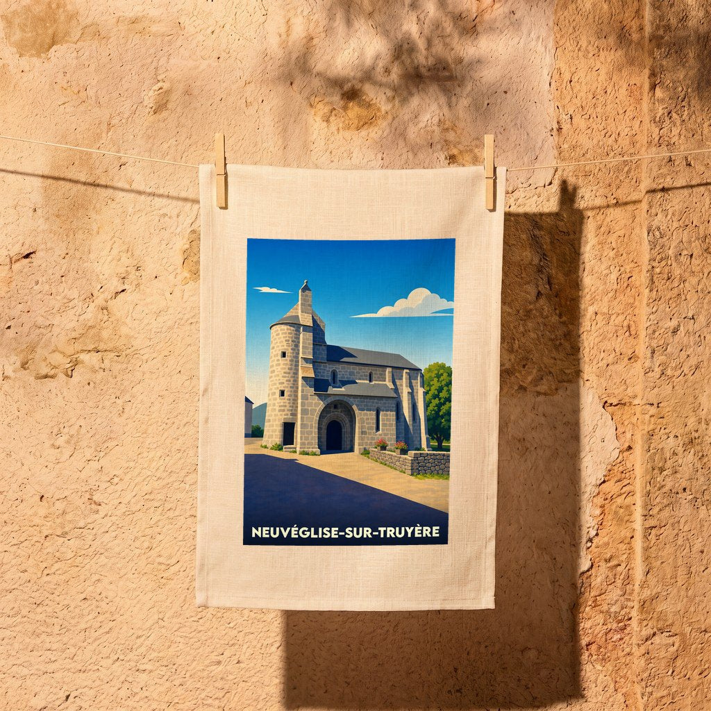 Torchon souvenir de la ville de Neuvéglise-sur-Truyère avec une illustration stylisée de son église.