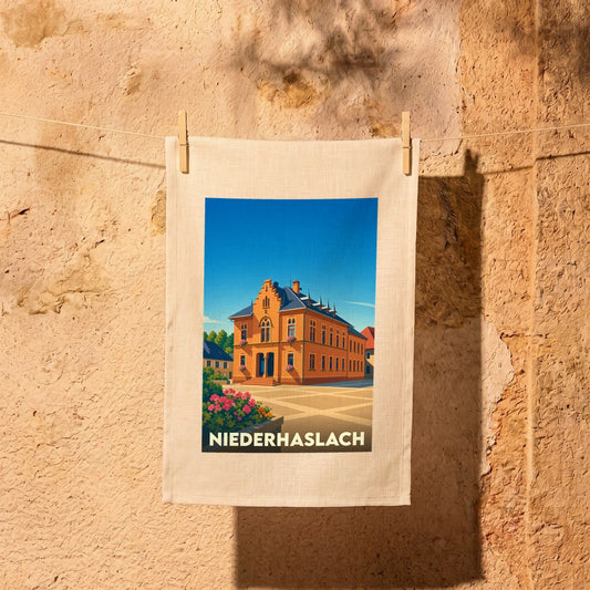 Torchon souvenir de la ville de Niederhaslach avec une illustration stylisée.