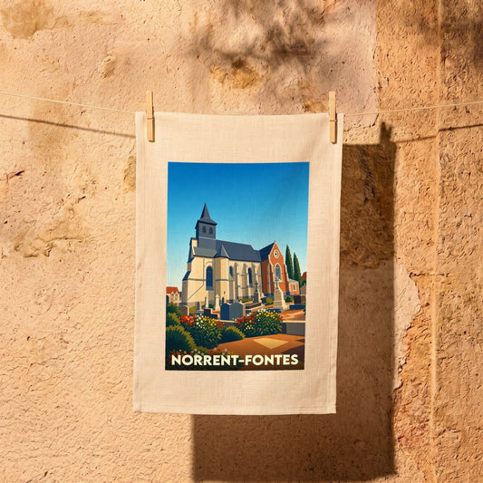 Torchon souvenir de la ville de Norrent-Fontes avec une illustration stylisée de son église et de son cimetière.
