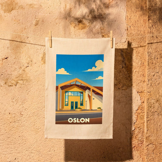 Torchon souvenir de la ville de Oslon avec une illustration stylisée d'un bâtiment moderne sous un ciel bleu.