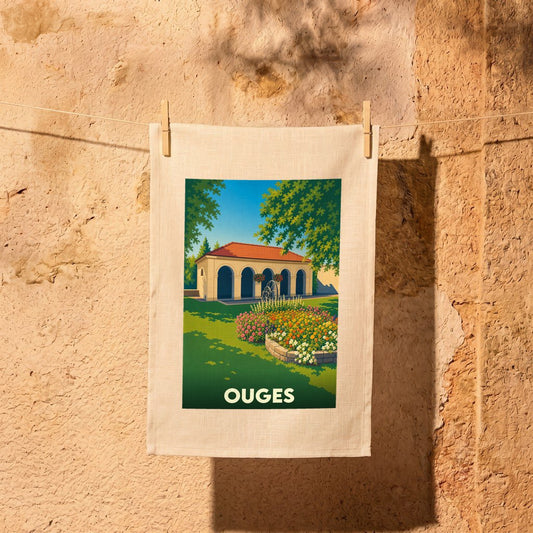 Torchon souvenir de la ville de Ouges avec une illustration stylisée.
