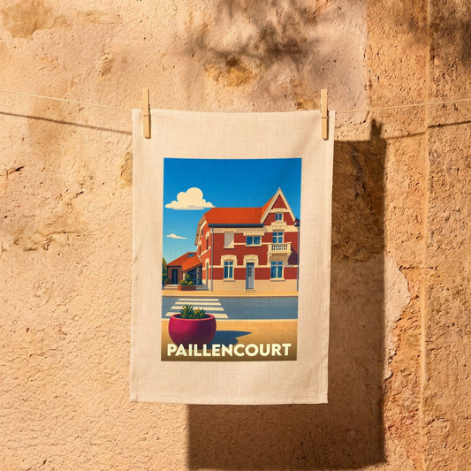 Torchon souvenir de la ville de Paillencourt avec une illustration stylisée d'une maison typique en briques.
