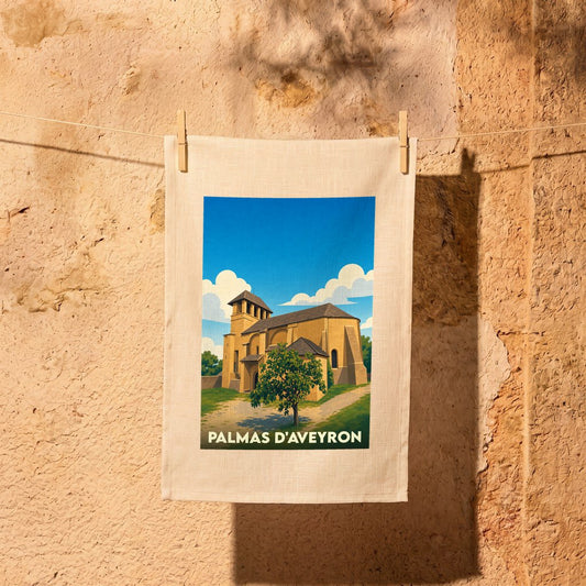Torchon souvenir de la ville de Palmas d'Aveyron illustré par une église stylisée sous un ciel bleu.
