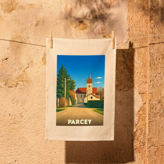 Torchon souvenir de la ville de Parcey orné d'une illustration stylisée de son église et de ses paysages.