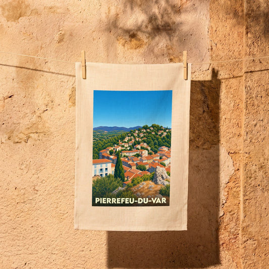 Torchon souvenir de Pierrefeu-du-Var avec une illustration stylisée du village perché.