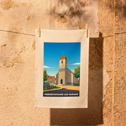 Torchon souvenir de la ville de Pierrefontaine-les-Varans avec une illustration stylisée de son église.