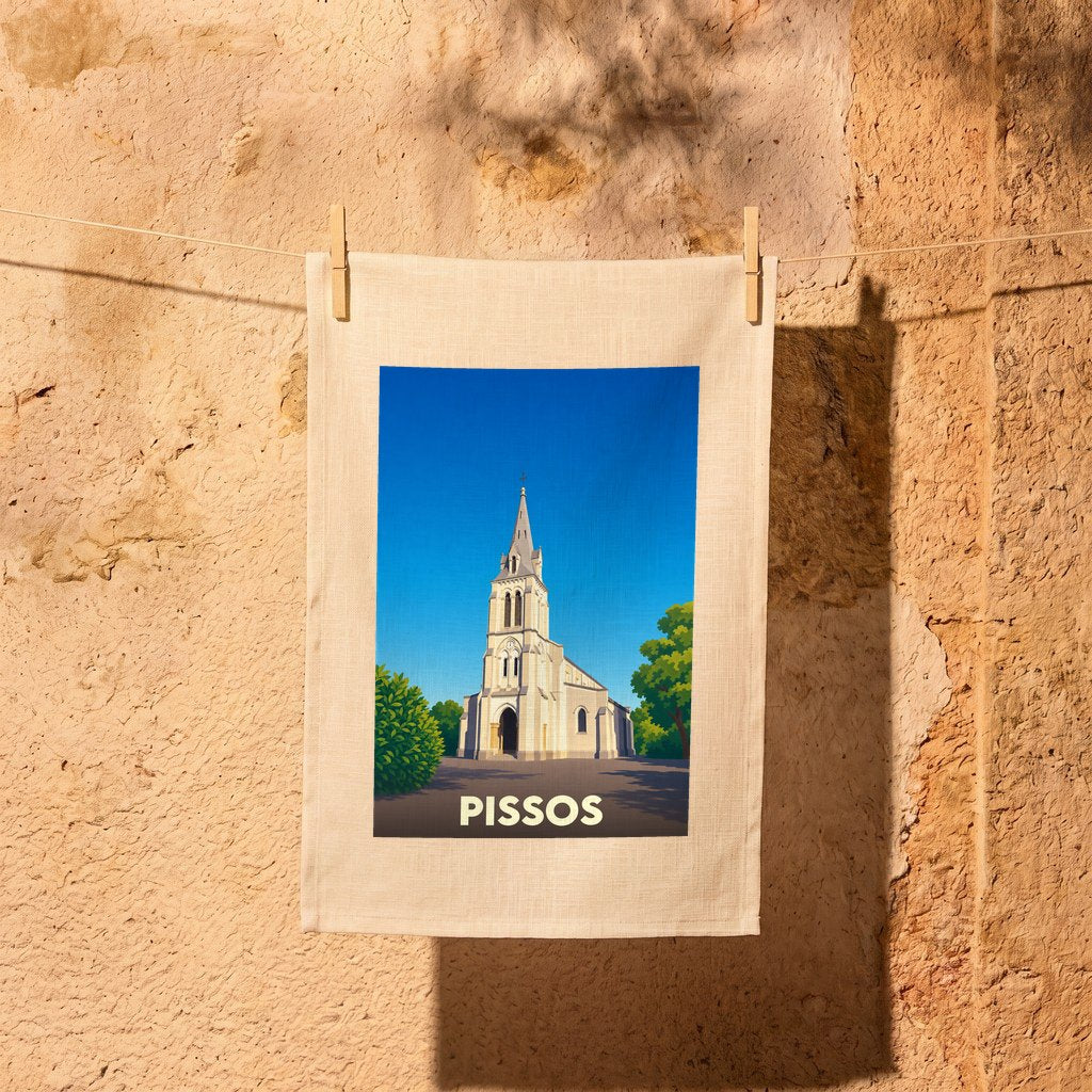 Torchon souvenir de la ville de Pissos avec une illustration stylisée de son église sous un ciel bleu.