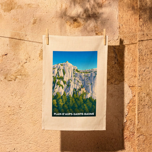 Torchon souvenir de la ville de Plan-d'Aups-Sainte-Baume avec une illustration stylisée de ses falaises de calcaire.