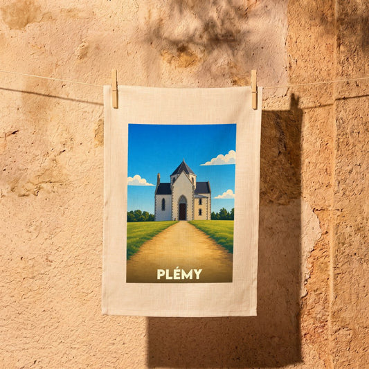 Torchon souvenir de la ville de Plémy avec une illustration stylisée de son église.