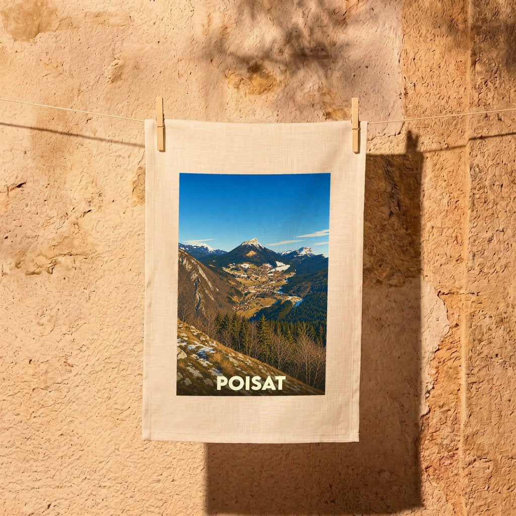 Torchon souvenir de la ville de Poisat avec une illustration stylisée d'un paysage montagneux.
