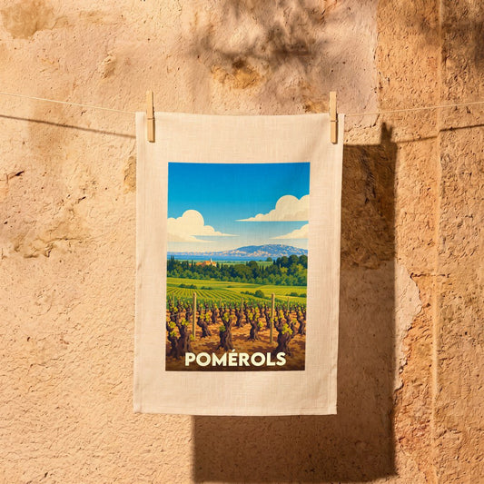 Torchon souvenir de la ville de Pomérols avec une illustration stylisée d'un vignoble ensoleillé.