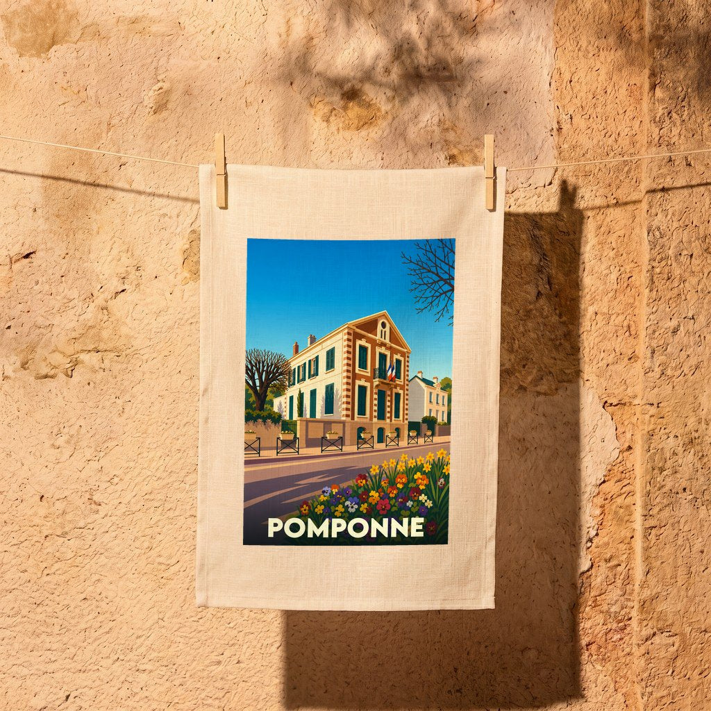 Torchon souvenir de la ville de Pomponne orné d'une illustration stylisée de son architecture.