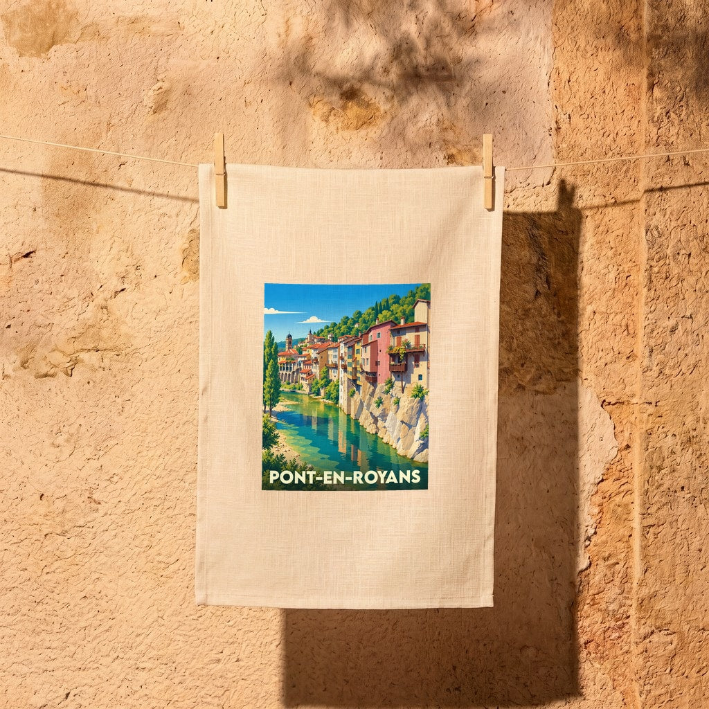 Torchon souvenir de la ville de Pont-en-Royans avec une illustration stylisée de ses maisons suspendues au-dessus de l'eau.