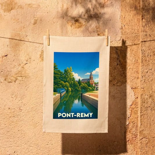 Torchon souvenir de la ville de Pont-Remy avec une illustration stylisée représentant son canal et son église.