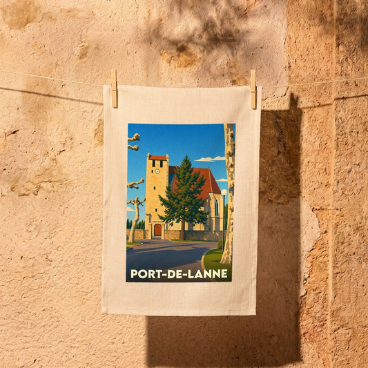 Torchon souvenir de Port-de-Lanne avec une illustration stylisée de son église.